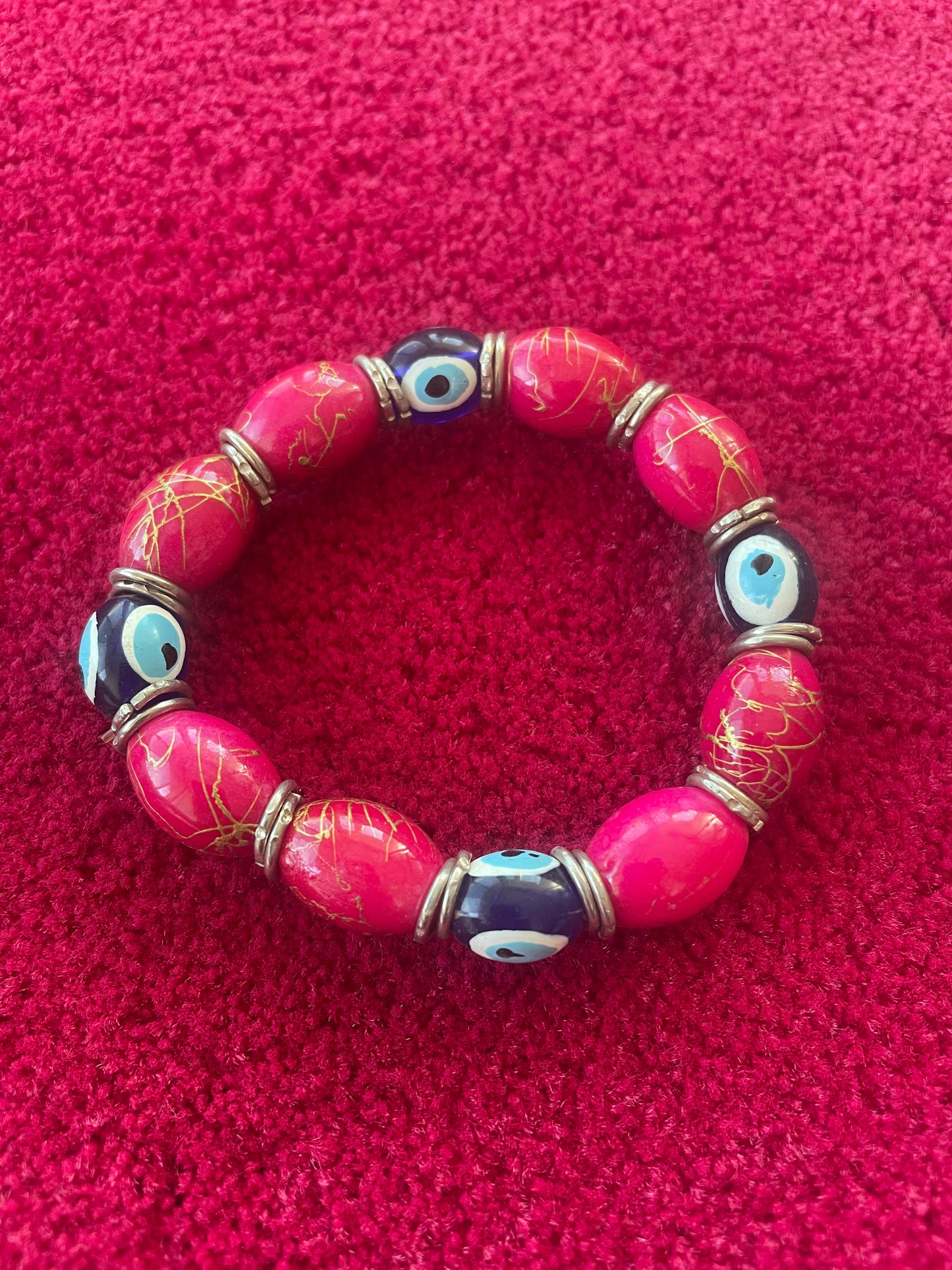 Bracelet Extensible Rouge avec Perles et Œil Porte-Bonheur