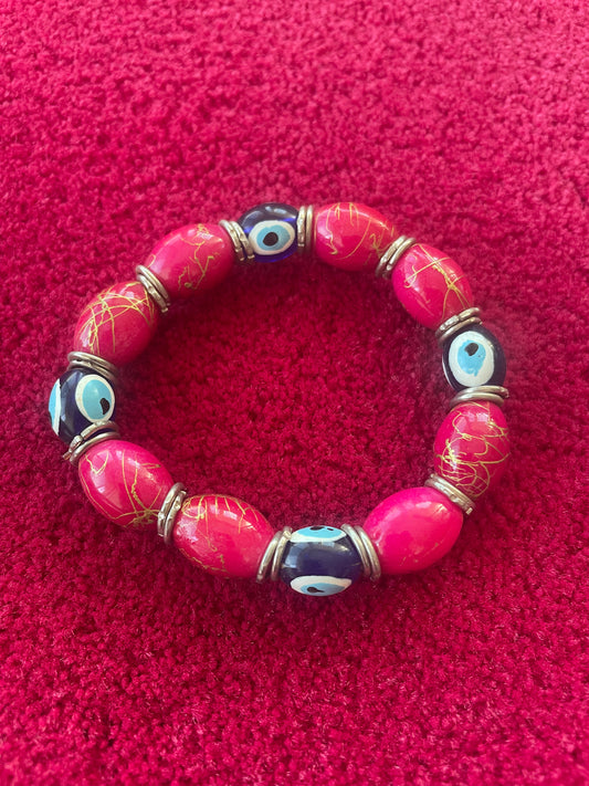 Bracelet Extensible Rouge avec Perles et Œil Porte-Bonheur